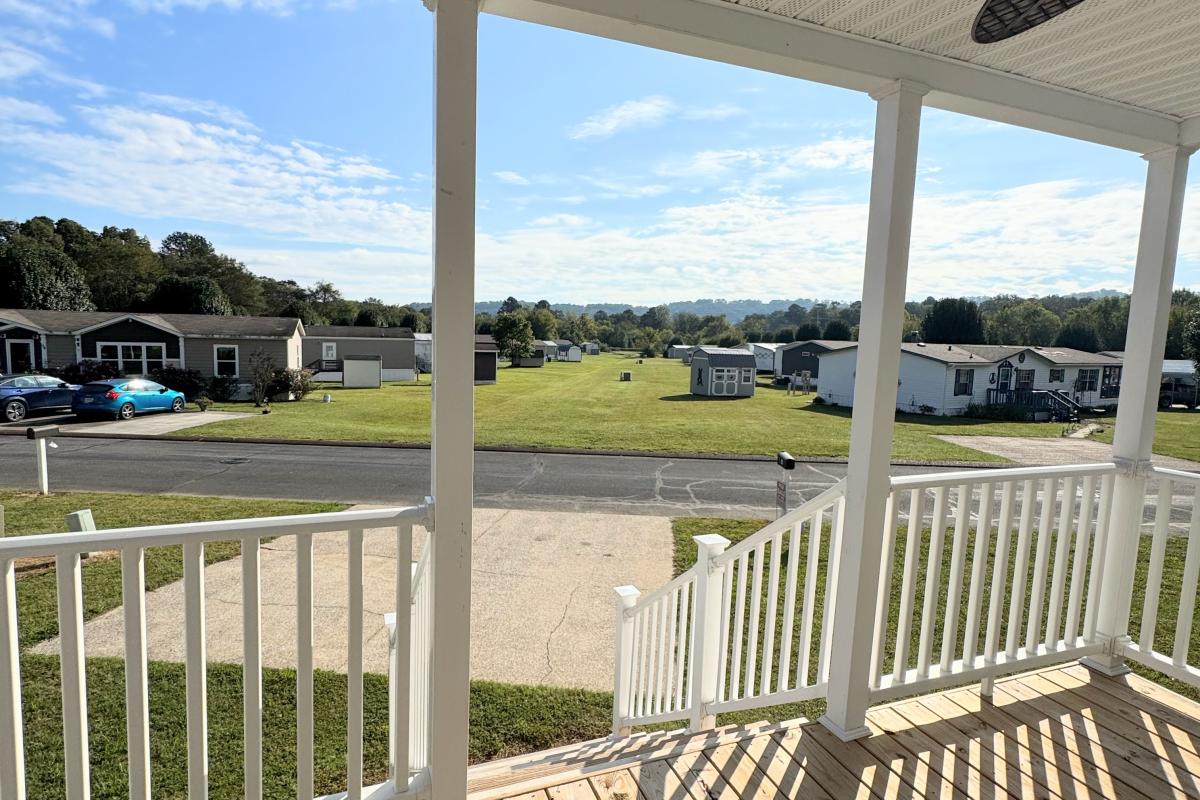 Enjoy a beautiful front porch with your morning coffee and a view overlooking Missionary Ridge.